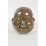 A Chinese bronze four face Buddha, 5" high, seal mark to base