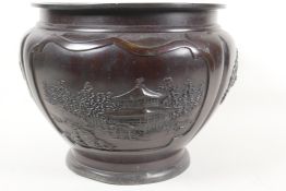 A Japanese Meiji period bronze jardiniere, embossed with formal garden scenes and flowers, seal mark