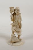 A Japanese Meiji period ivory okimono figure carrying a scroll, signed in red cartouche to the base,