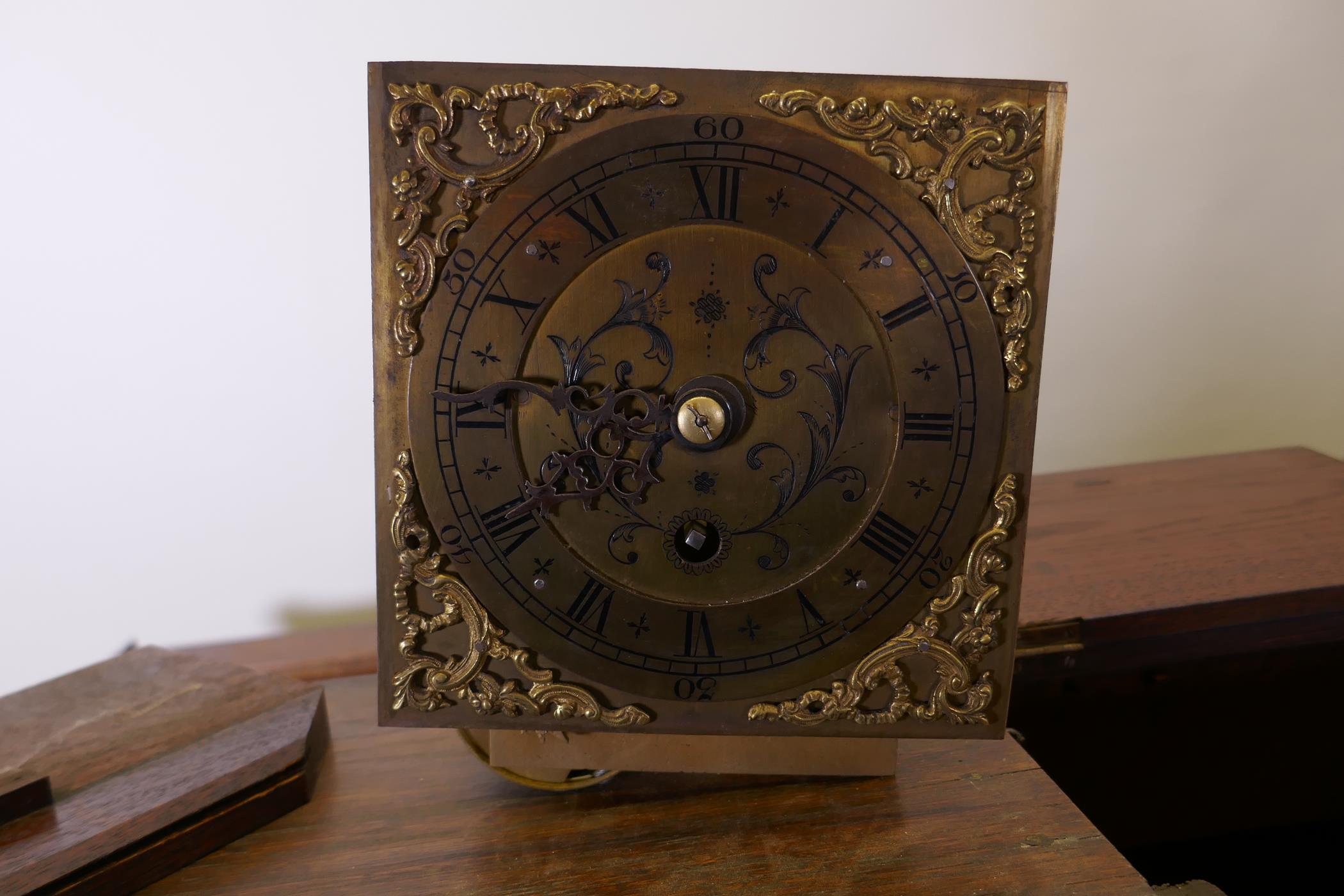 An early C20th oak Jacobean style dresser, the rack fitted with a fusee clock with brass dial, and - Image 7 of 9