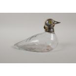 A silver plate and glass decanter in the form of a duck, 7½" long