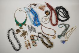 A collection of assorted costume jewellery, mostly necklaces and many semi precious stones