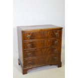 A mahogany chest of four long drawers, raised on bracket feet, 29" x 18" x 30" high