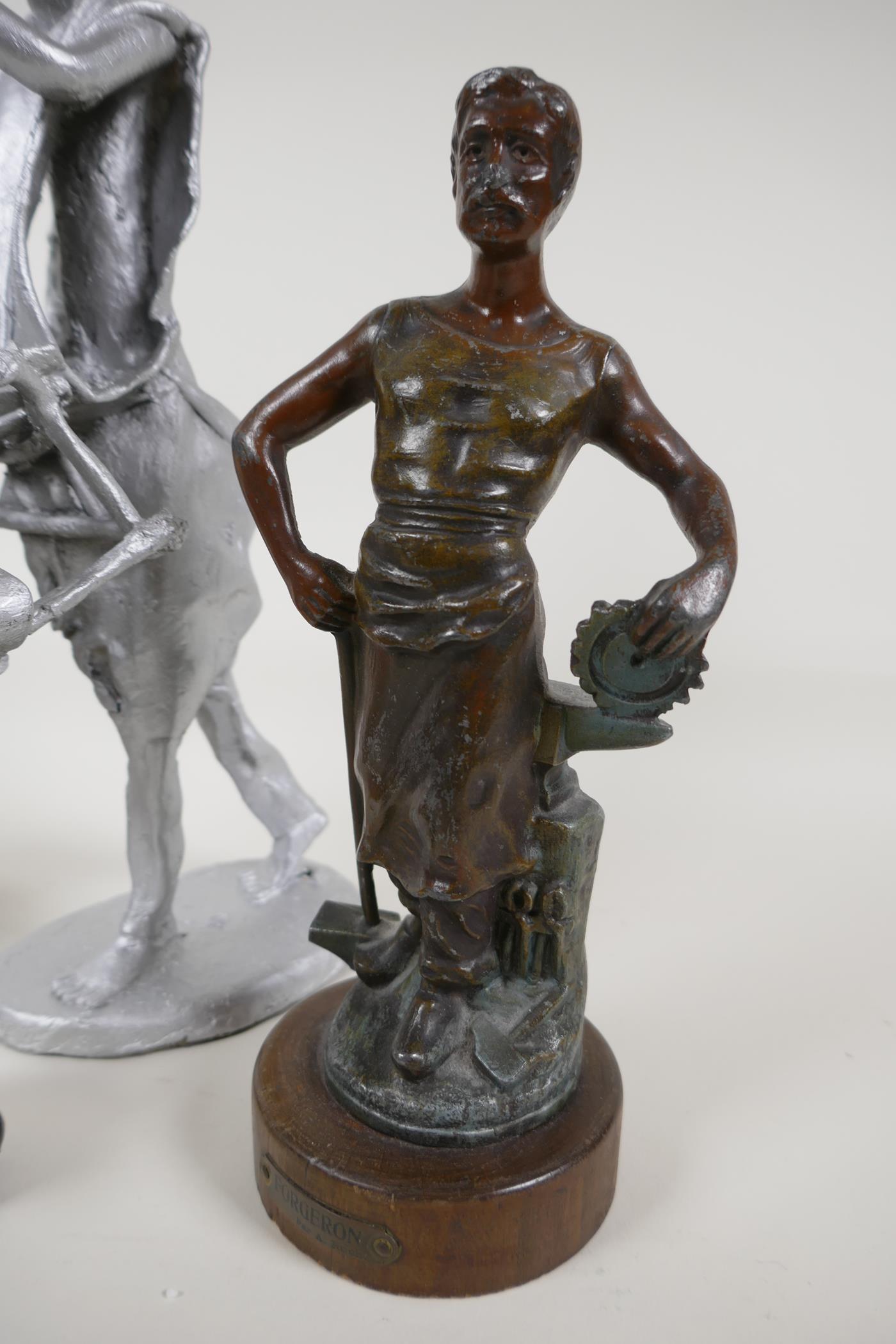 A bronzed spelter figure of a foundry worker, and iron trick train money box, a painted metal figure - Image 2 of 5