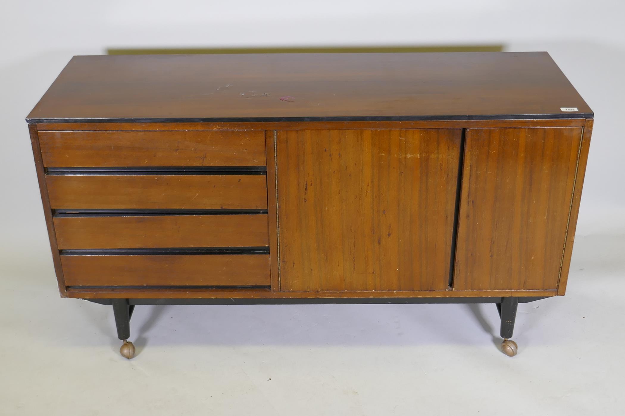 A mid-century mahogany sideboard with ebonised detail, comprising two cupboards and four drawers, - Image 2 of 6