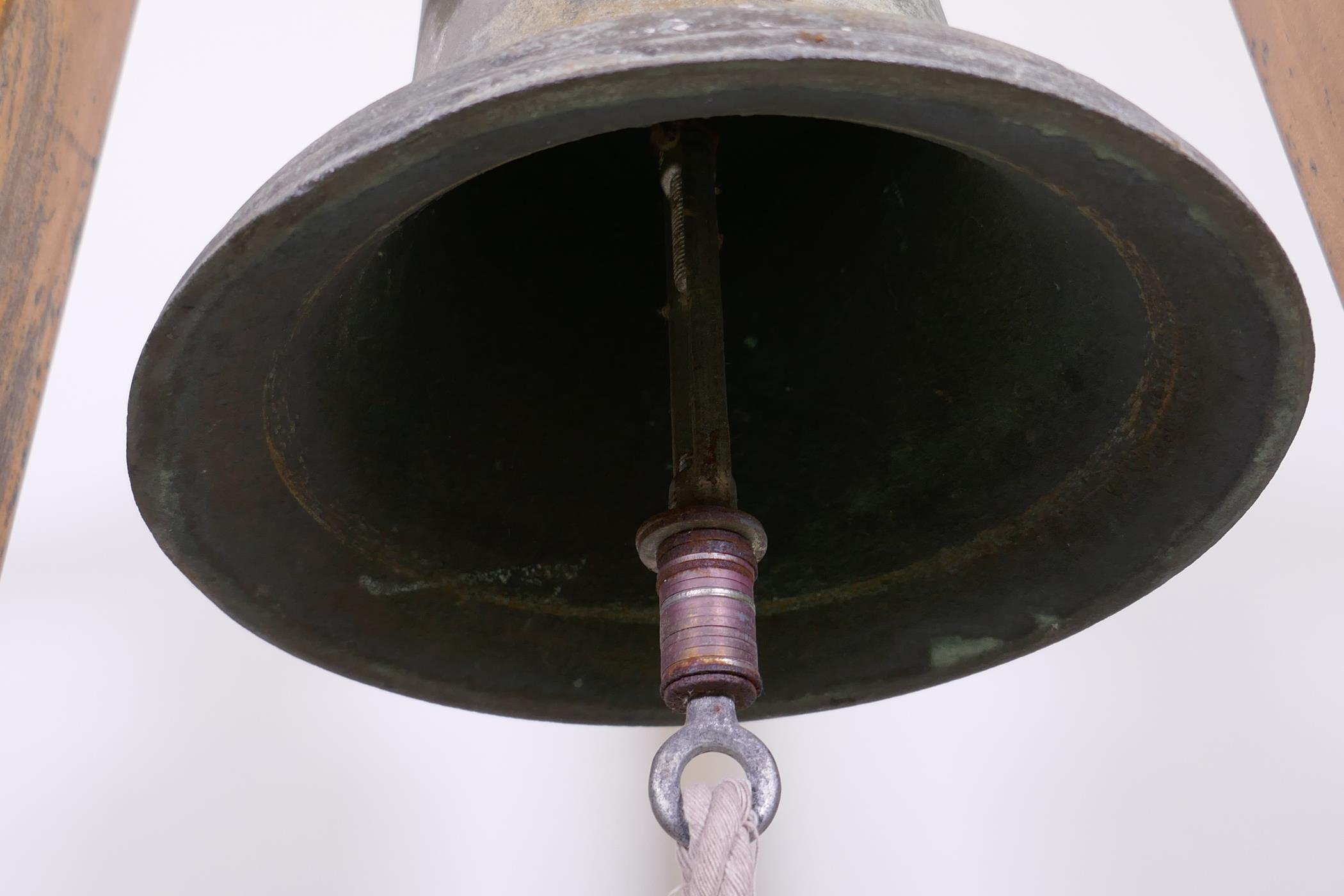 Antique bronze bell, mounted in a pine frame, 45" x 26" x 25" - Image 3 of 4