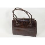 A vintage caiman skin handbag, 10" wide