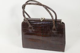 A vintage caiman skin handbag, 10" wide