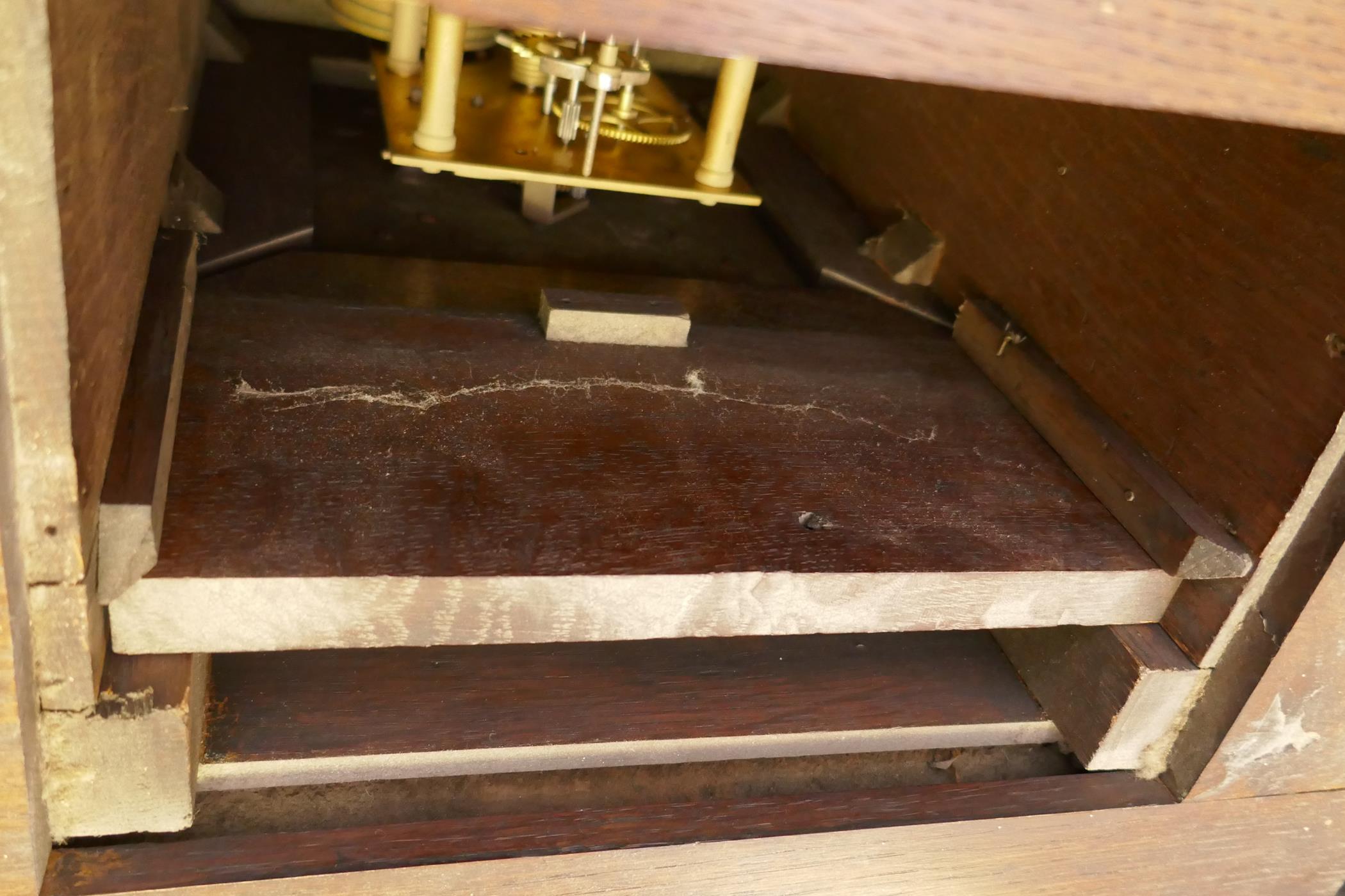 An early C20th oak Jacobean style dresser, the rack fitted with a fusee clock with brass dial, and - Image 8 of 9