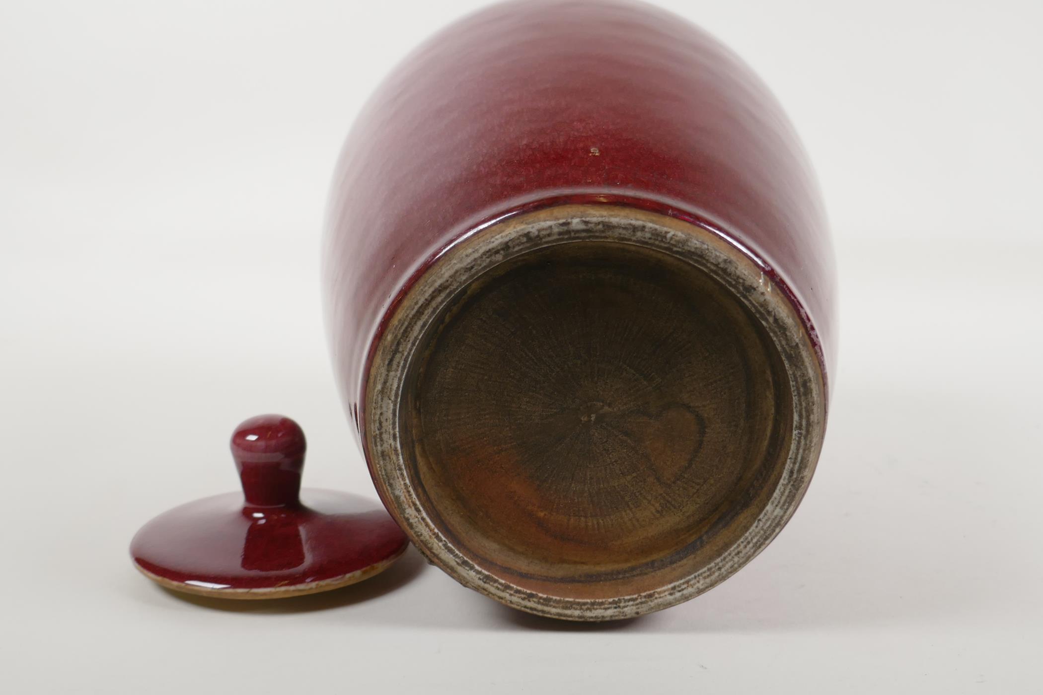 A Chinese iron red glazed porcelain jar and cover, 10½" high - Image 4 of 4