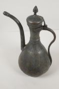 An Omani silver on copper coffee pot, 13½" high