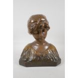 A glazed terracotta bust of a girl in a shawl, 12 high