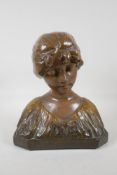 A glazed terracotta bust of a girl in a shawl, 12 high