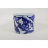 A Chinese blue and white porcelain brush pot decorated with travellers in a landscape, 6 character