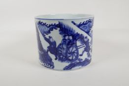 A Chinese blue and white porcelain brush pot decorated with travellers in a landscape, 6 character