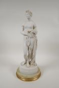 A Copeland parian figure of Venus after John Gibson, with gilt highlights and painted details, on