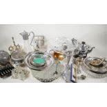 A large box of silver plated items including a claret jug, tazzas, teapots etc