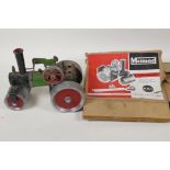 A Mamod S.R.1 live model steam roller, missing fire box, comes with remains of original box, 9" long