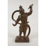 A Chinese gilt bronze of a deity with a flowing silk scarf, 10" high