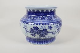 A blue and white porcelain jardiniere with scrolling fruit decoration, Chinese Qianlong seal mark to