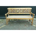 A teak garden bench, 55" long