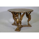 A vintage Italian giltwood centre table, raised on carved swan supports, 27" diameter x 19"