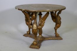 A vintage Italian giltwood centre table, raised on carved swan supports, 27" diameter x 19"