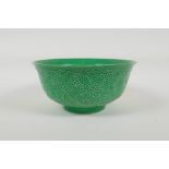 A green glazed porcelain rice bowl with raised dragon decoration, Chinese Yongzheng 6 character mark