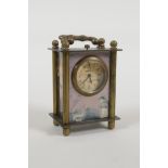 A brass cased carriage clock with printed pictorial enamel panels depicting classical paintings,