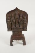 A Sino Tibetan bronze depicting five Buddist figures, 9" high