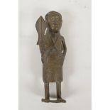 An African Benin bronze tribal figure, 7½" high