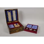 A Victorian coromandel games compendium box, with brass mounts inset with pietra dura, the