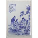 A Chinese blue and white plaque depicting figures playing go, 10½" x 16½"