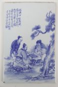 A Chinese blue and white plaque depicting figures playing go, 10½" x 16½"