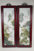 A pair of Chinese famille vert porcelain panels depicting riverside landscapes, in hardwood