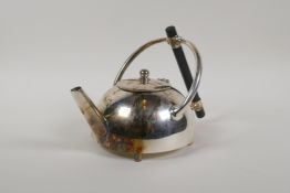 A Christopher Dresser style silver plated teapot, 5½" high