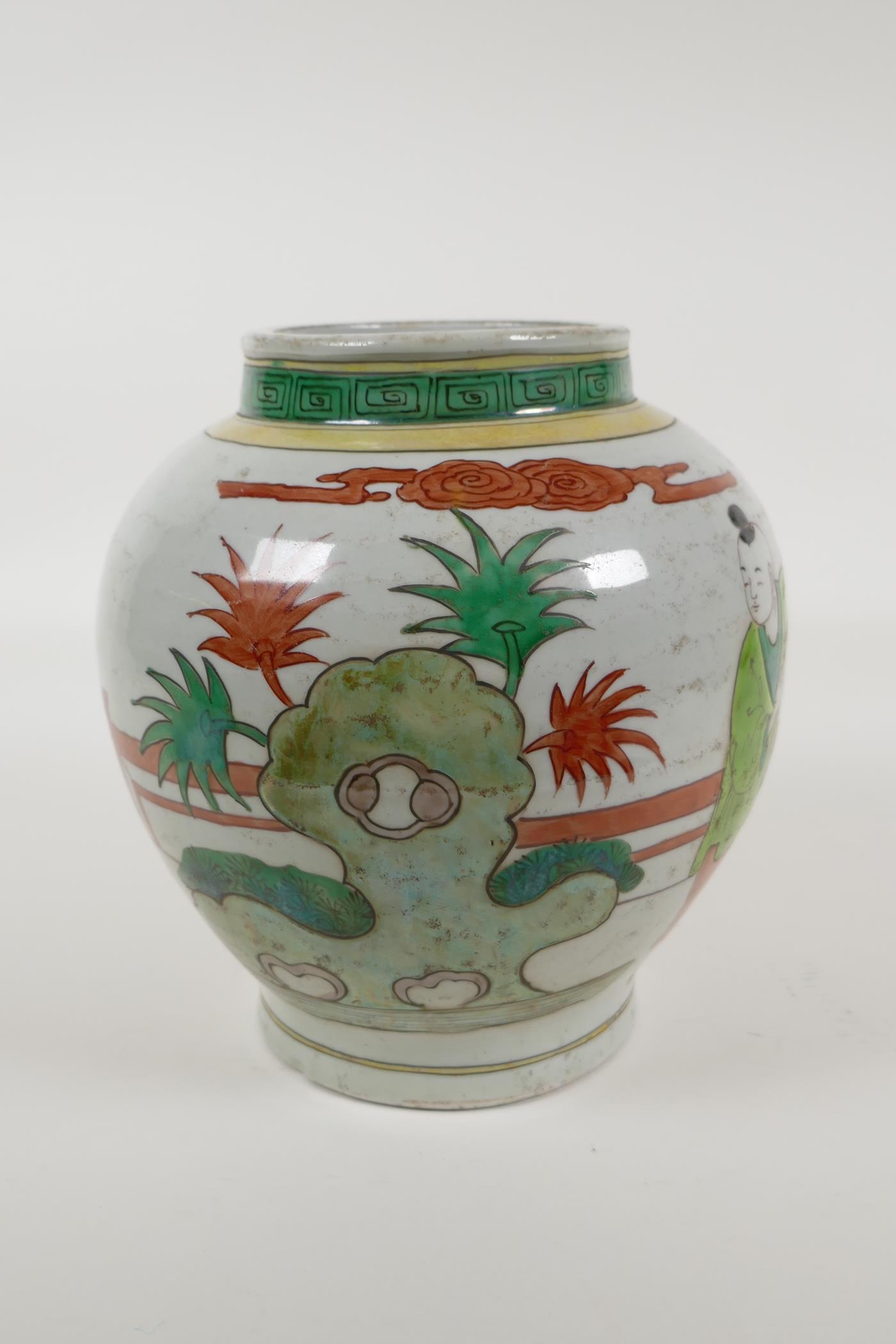 A Chinese Wucai porcelain jar decorated with women and children in a garden, 8½" high - Image 3 of 5