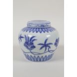 A blue and white ginger jar and cover with floral decoration, single Chinese character to base,