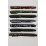 Seven 'Swan' Mabie Todd fountain pens, including three self-fillers, three leverless, and one minor,