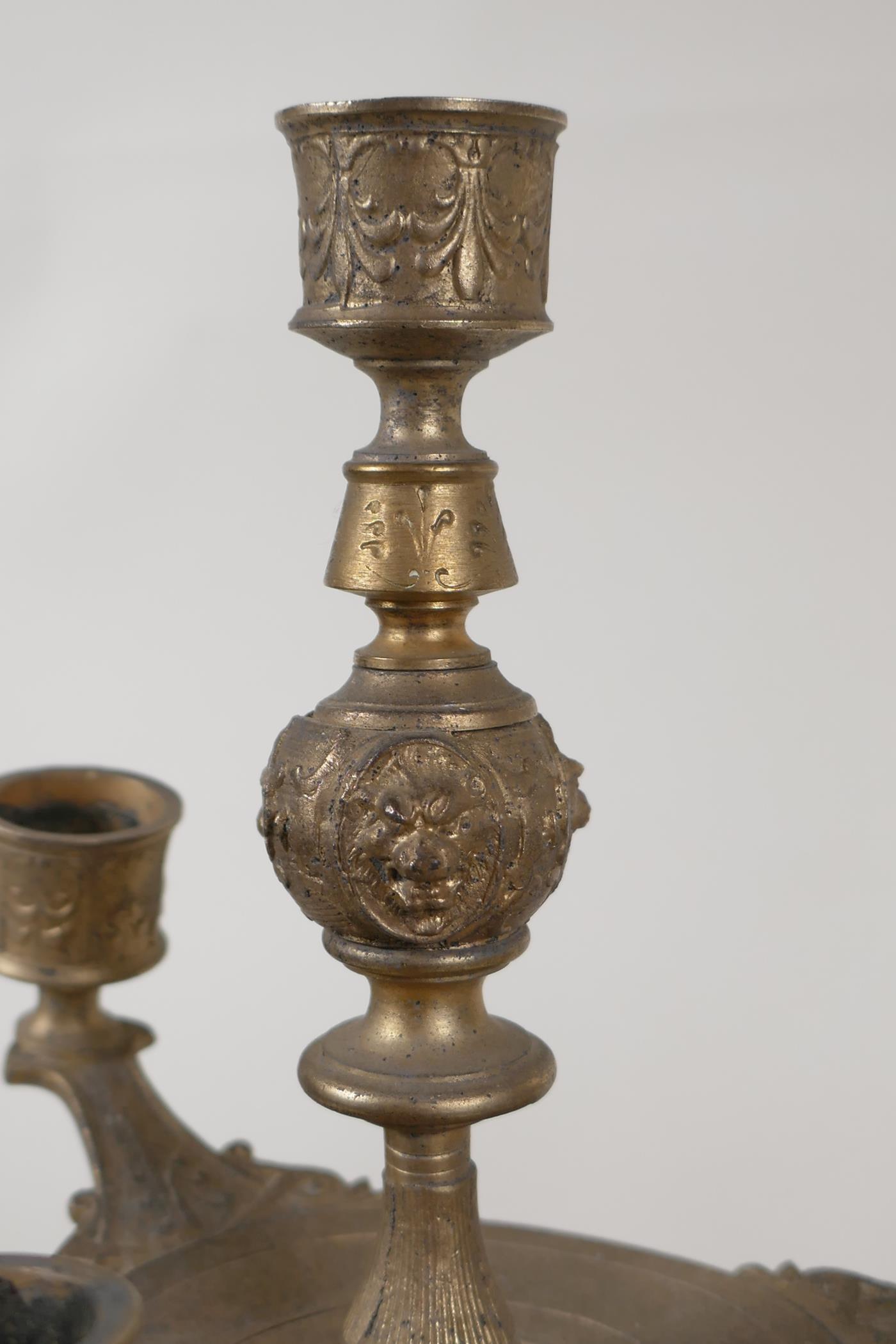 A pair of gilt metal three branch candlesticks of classical form, 17" high - Image 2 of 4