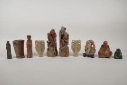 A collection of oriental soapstone and hardstone carved figures, spill vases and seals, largest 6"