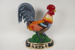 A painted cast iron door stop in the form of a cockerel, 13" high