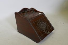 A Victorian mahogany and brass mounted coal scuttle with carved decoration, 18" x 13" x 13"