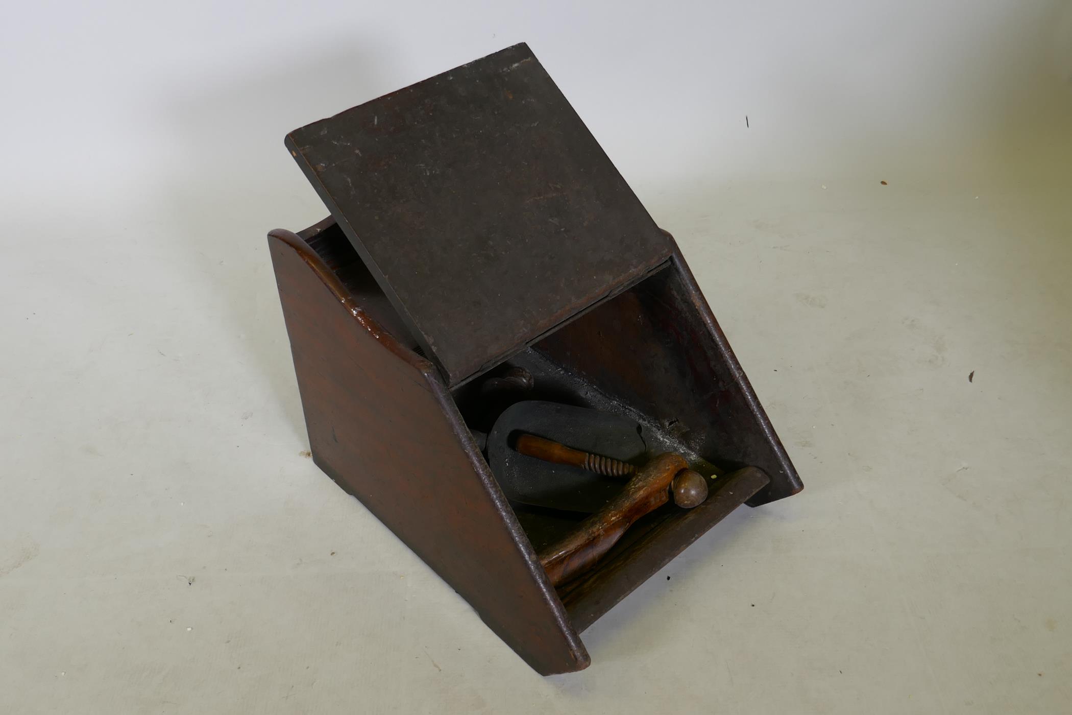 A Victorian mahogany and brass mounted coal scuttle with carved decoration, 18" x 13" x 13" - Image 2 of 3