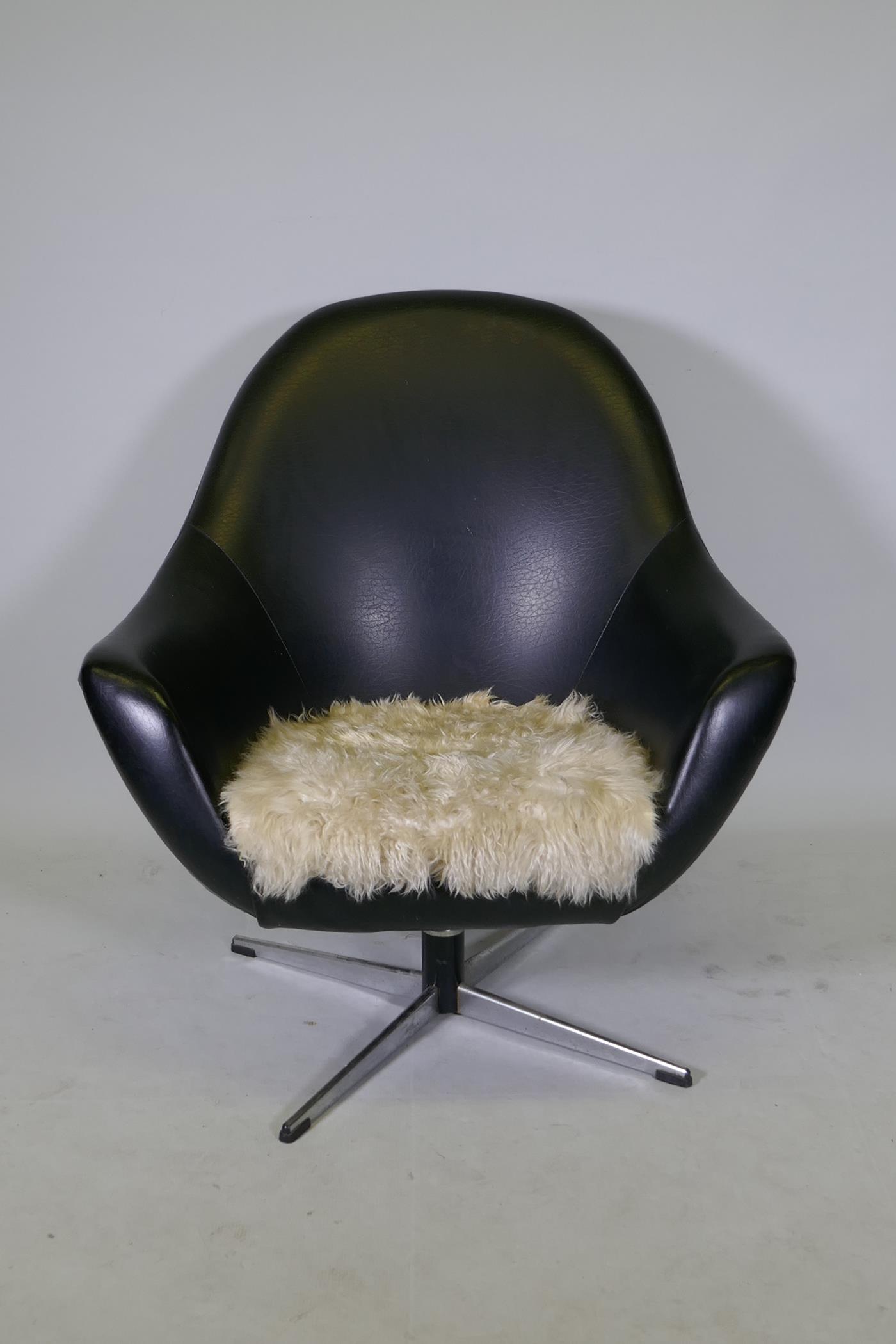 A 1970s leatherette and chrome swivel armchair - Image 2 of 2
