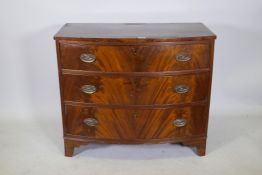 A Victorian figured mahogany bow front chest of drawers, raised on bracket feet, 37" x 20", 31" high