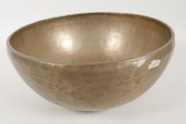 A Tibetan brass singing bowl, 11½" diameter