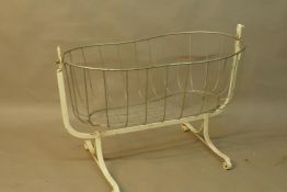 A Victorian painted wrought iron cradle, 40" x 22", 29" high