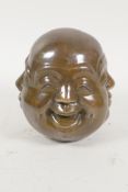 A Chinese bronze four face Buddha, 5" high, seal mark to base