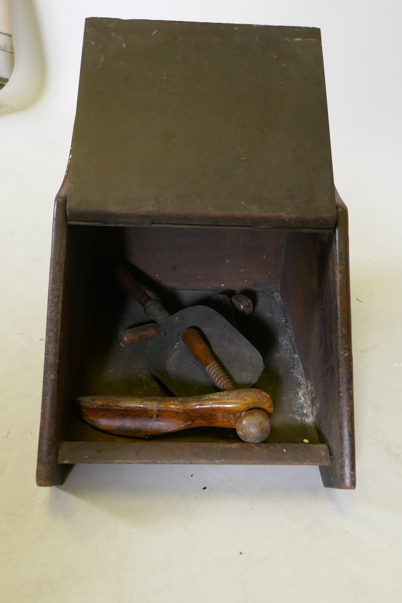 A Victorian mahogany and brass mounted coal scuttle with carved decoration, 18" x 13" x 13" - Image 3 of 3